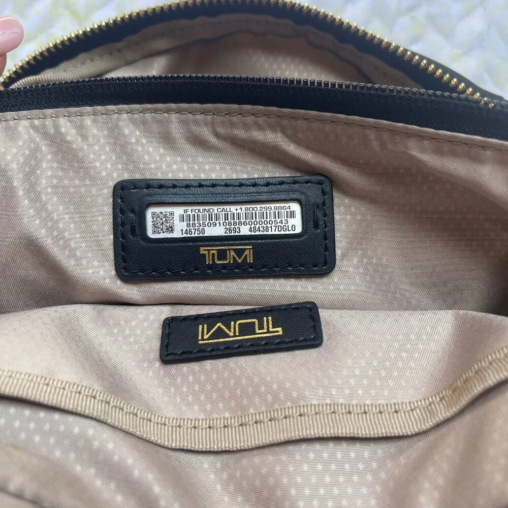 Tumi authentic new
